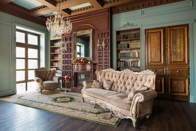 Luxury interior of home library. Sitting room with elegant furniture