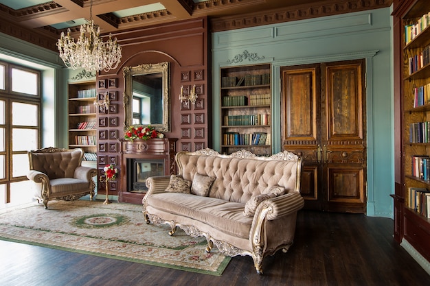 Luxury interior of home library. Sitting room with elegant furniture