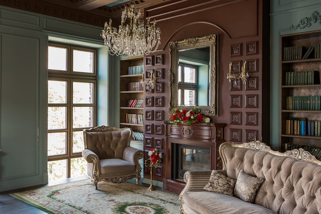 Luxury interior of home library. Sitting room with elegant furniture