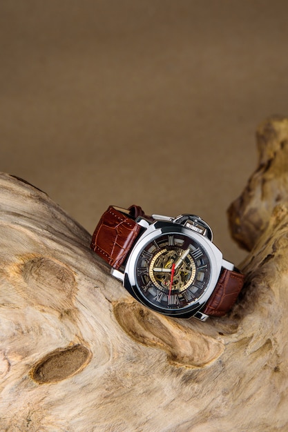 Luxury man wrist watches placed on timber