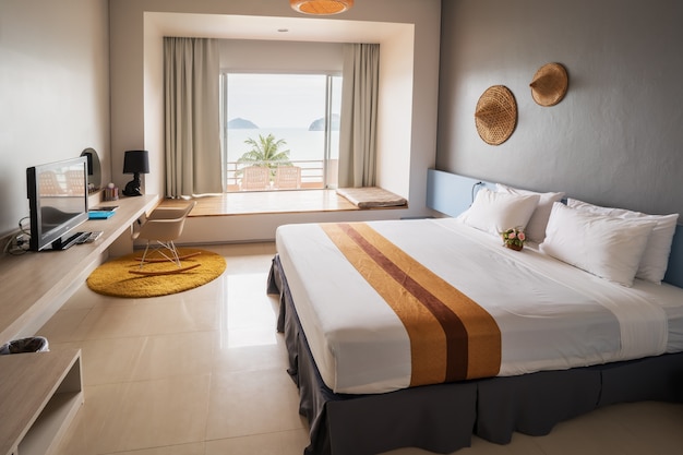 Photo luxury modern cozy sea view double bedroom