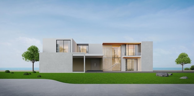 Роскошный современный дом на траве с видом на море и голубым небом Концепция недвижимости или собственности
