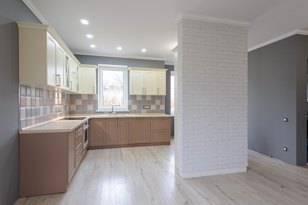 Luxury modern provence styled grey, pink and cream kitchen interior