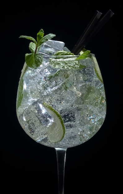 Luxury mojito in a large glass on a black background an alcoholic cocktail in a chic restaurant