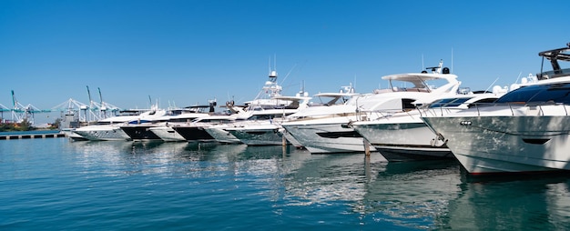 Luxury motor yacht boats at sea berth in South Beach USA