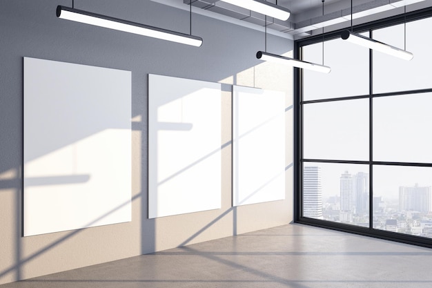 Luxury office hall interior with three blank posters on\
wall