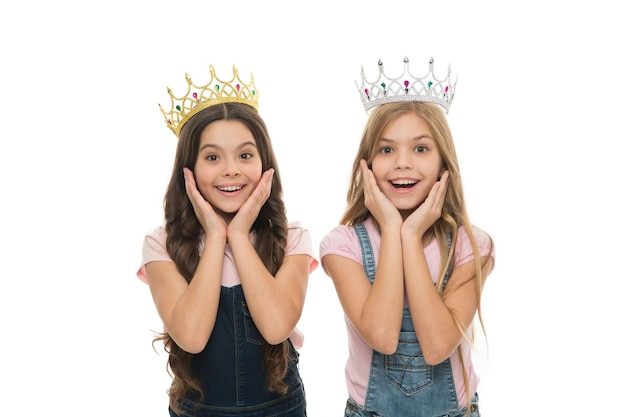 Luxury and prestige Small cute children wearing luxury crowns Adorable little girls with luxury and glamoury look Reaching the height of luxury and elegance