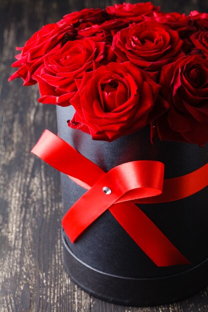 Luxury red roses on a wood