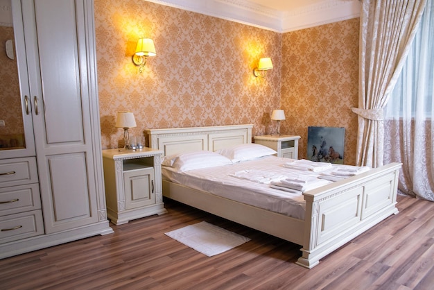 Luxury room with vintage wallpaper and double bed