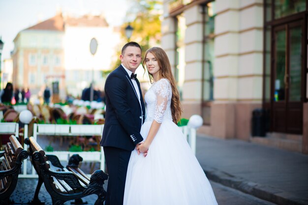 Luxury stylish young bride and groom