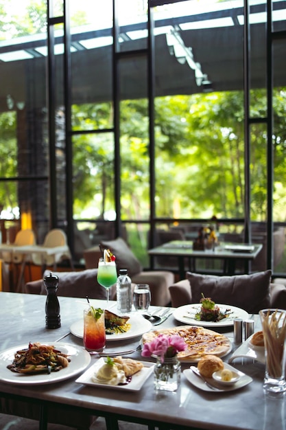 Luxury table settings for fine dining served and decorated table with food for guests in the restaurant