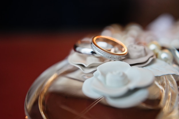 Luxury wedding rings with diamonds on flowers