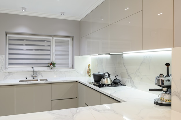 Luxury white modern marble kitchen in studio space