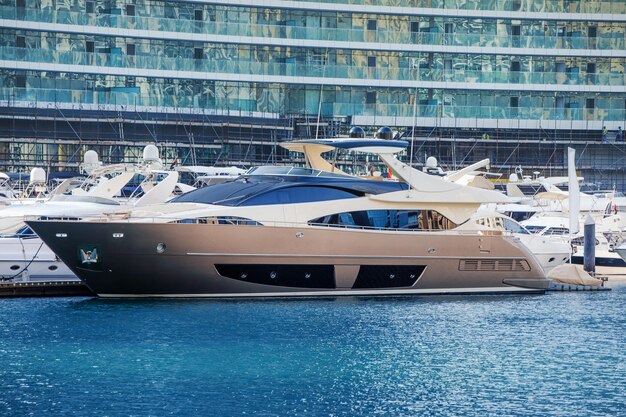 Luxury yacht and boat parking in Dubai Marina port The concept of tourist cruises and wealth