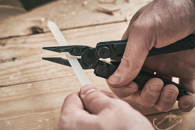 Photo lviv ukraine december 21 2023 multitool leatherman wave plus black