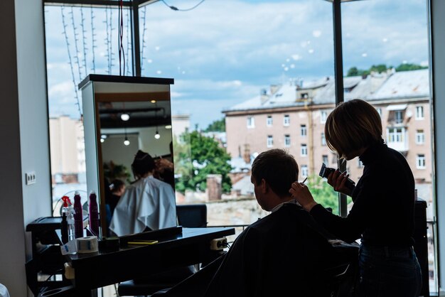 LVIV UKRAINE July 3 2018 haircut in beauty saloon