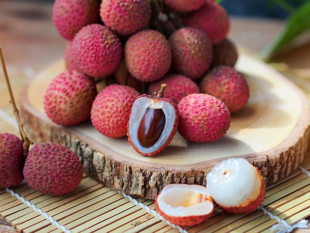 Lychee fruit on wooden table