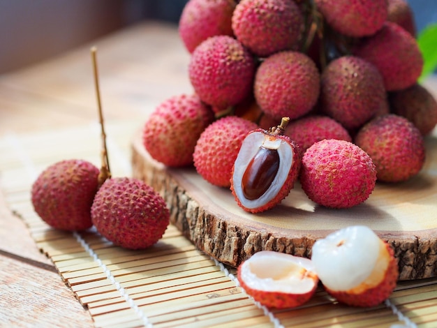 Lychee fruit on wooden table