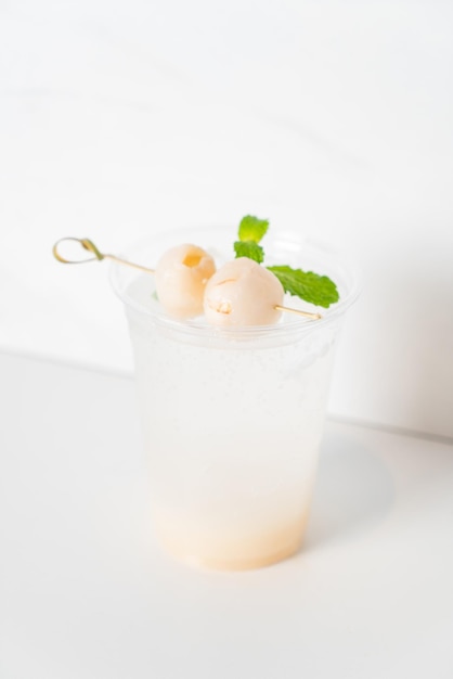 Lychee with soda in glass