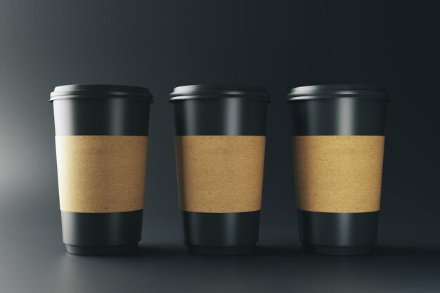 Foto maak drie zwarte koffiekopjes leeg