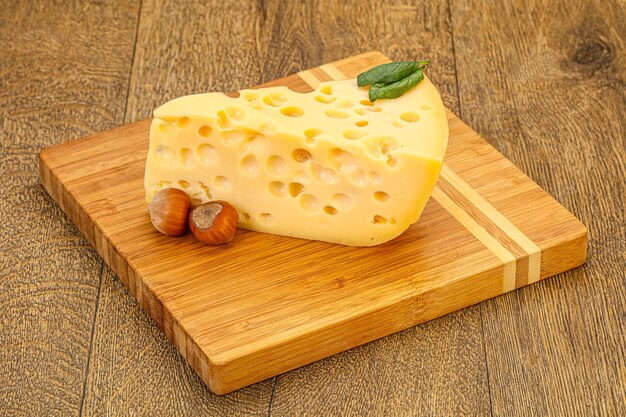 Maasdam cheese yellow triangle with holes