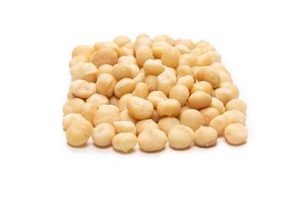 Macadamia nuts isolated on white background. Top view.