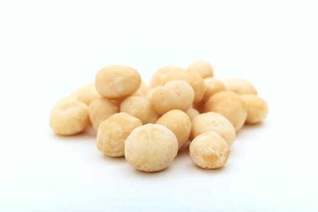 Macadamia nuts on white background