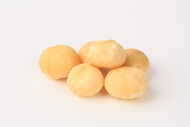 Macadamia nuts on a white background