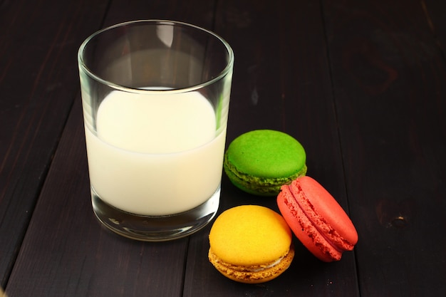 Macaron colored cookies with milk