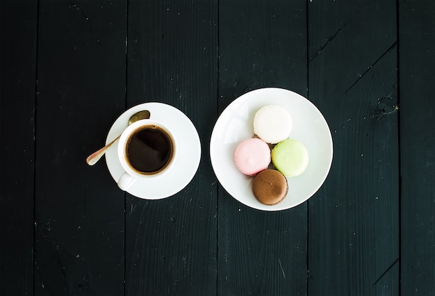 Macaron cookies and cup of espresso