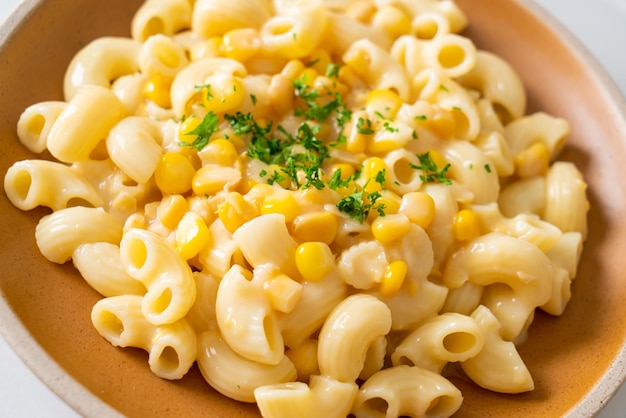 Macaroni creamy corn cheese on plate