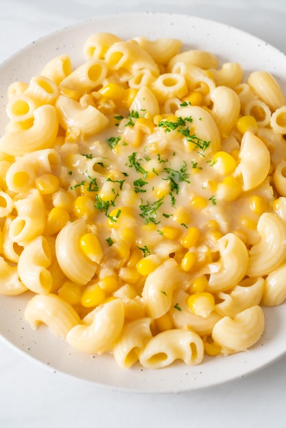 Macaroni creamy corn cheese on plate