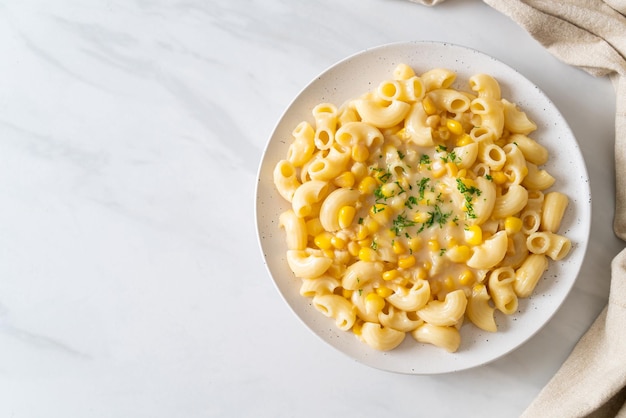 Macaroni creamy corn cheese on plate