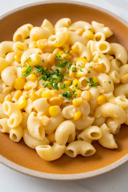 Macaroni creamy corn cheese on plate