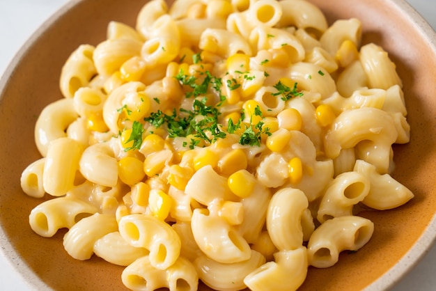 Macaroni creamy corn cheese on plate