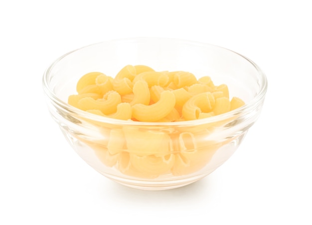 Macaroni in a glass cup on white