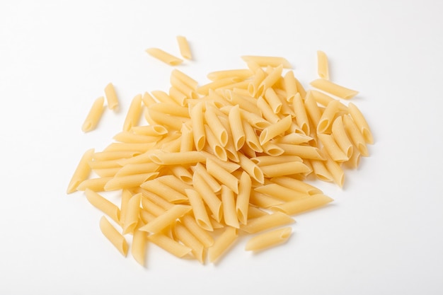 Macaroni on a white background. Italian macaroni on a white background