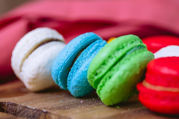 Macarons on wooden board in macrophotography