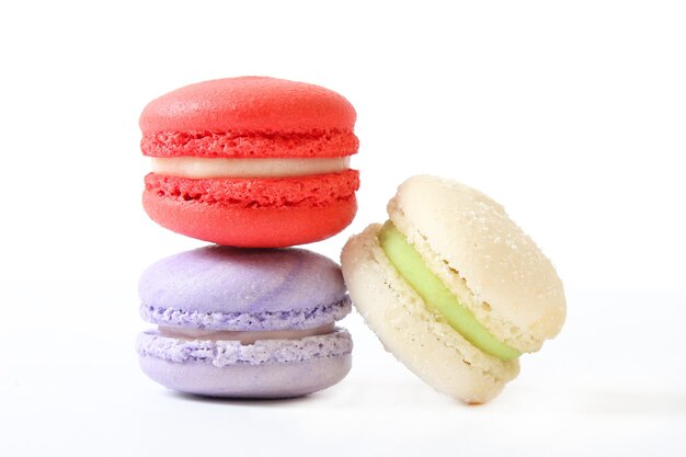 Macaroon cakes on a white background closeup