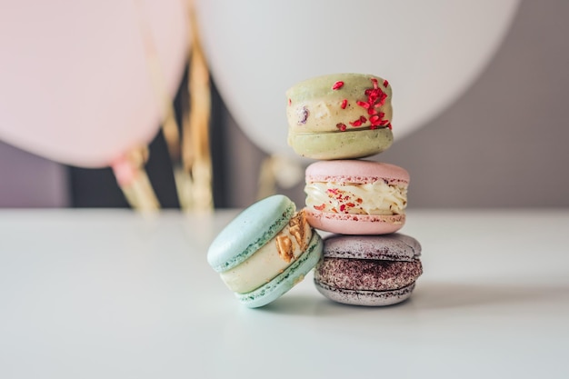 Macaroons closeup on a white table in a cafe