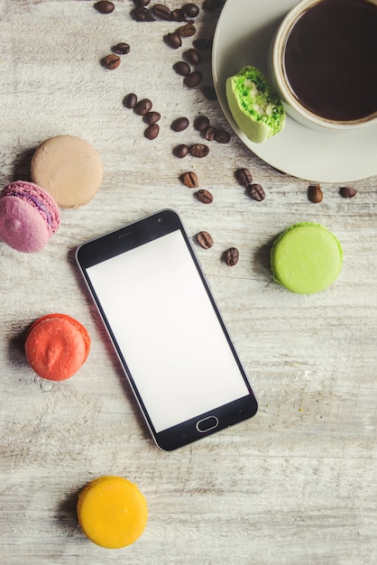 Macaroons and coffee. breakfast. selective focus. food