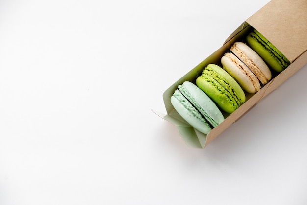  macaroons in craft paper box