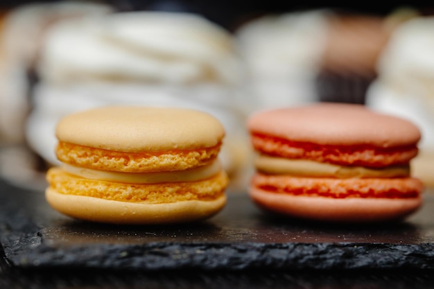 Macaroons on a table Closeup of macarons cakes Culinary and cooking concept