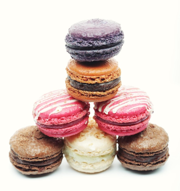 Macaroons over white background