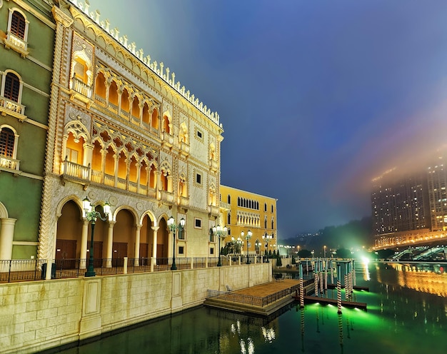 Macau Casino and Hotel, luxury resort in Macao, China. Late in the evening. Golden light illumination