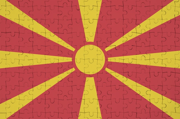 Macedonia flag  is depicted on a folded puzzle