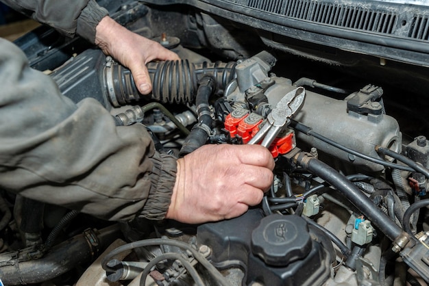 Machanic repairman at the LPG converted engine