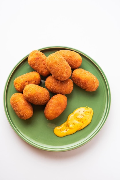 Macher Chop Bengali style fish cutlet or pakora a popular festival snack from west Bengal