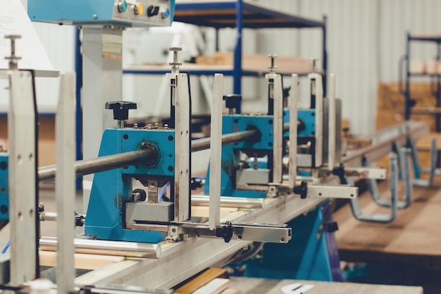 A machine for drilling holes in wooden slats for horizontal blinds