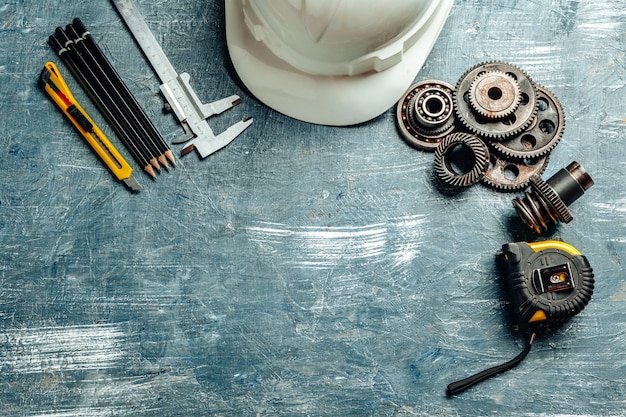 Machine engineer tools set on dark wooden 